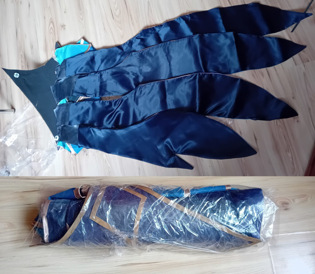 Transport cosplayu - peleryna do Xayah